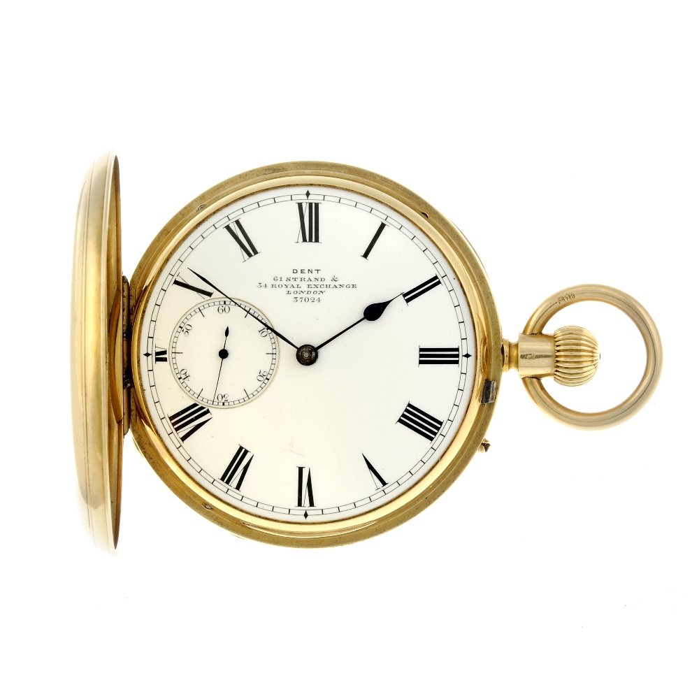 A full hunter pocket watch by Dent. 18ct yellow gold: A full hunter pocket watch by Dent. 18ct yellow gold case, hallmarked London 1874. Numbered 37024. Signed three quarter plate keyless wind movement with ratchet tooth lever escapement. White enamel di