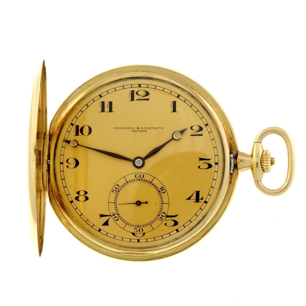 A full hunter pocket watch by Vacheron Constantin.: A full hunter pocket watch by Vacheron Constantin. Yellow metal case, stamped 18K with poincon. Numbered 242352. Signed keyless wind movement with club tooth lever escapement. Champagne dial with Arab