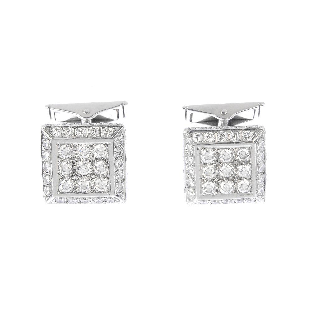 A pair of 18ct gold diamond cufflinks. Each designed as (1 of 2)