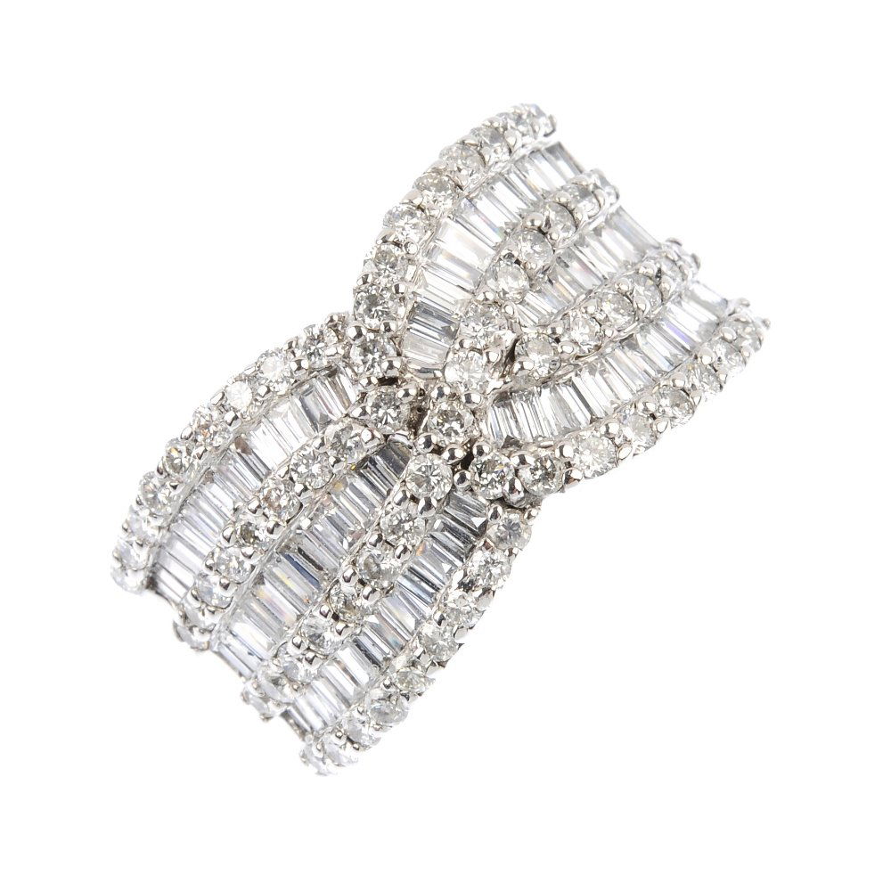 A 14ct gold diamond dress ring. Designed as a series of (1 of 3)