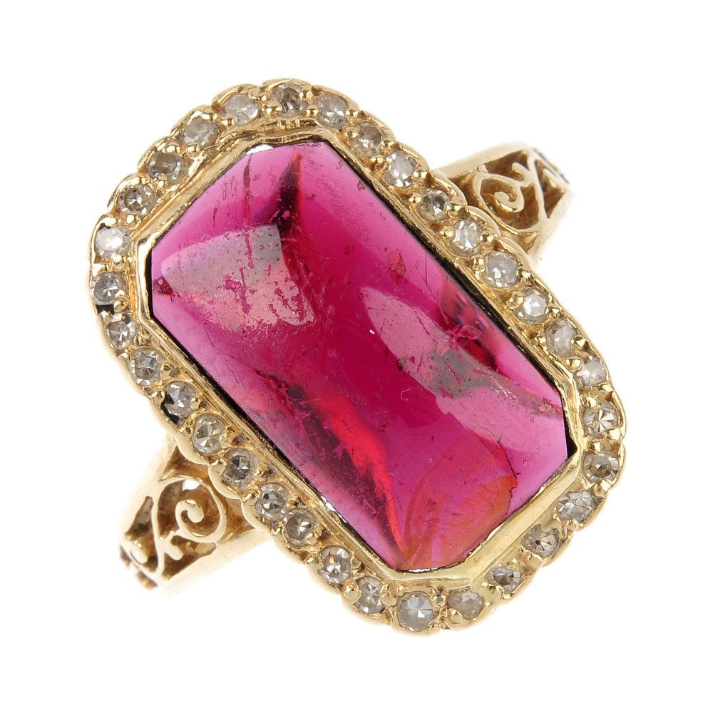A garnet and diamond cluster ring. The rectangular (1 of 3)
