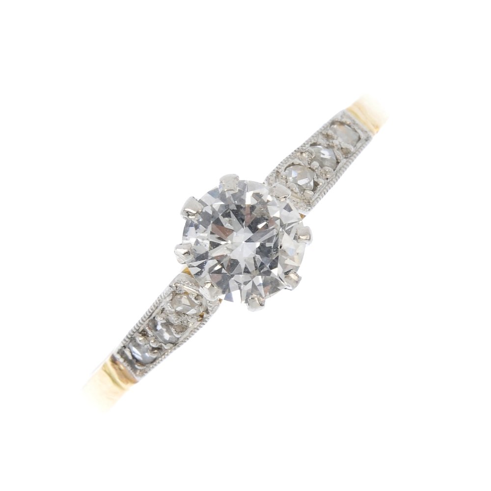 A mid 20th century 18ct gold diamond single-stone ring. (1 of 3)