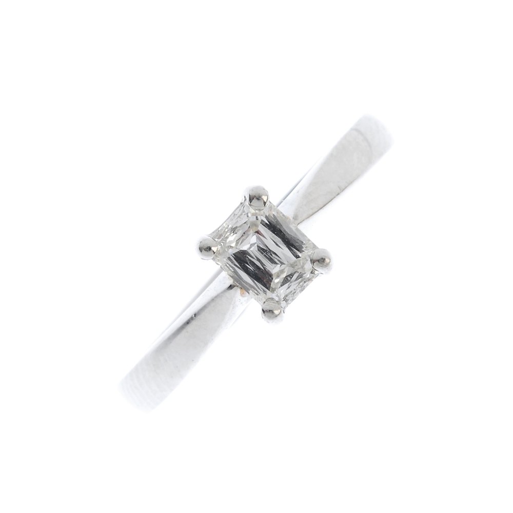 A platinum diamond single-stone ring. The (1 of 3)