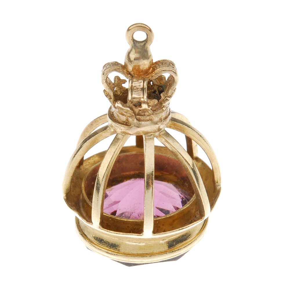 A 9ct gold paste fob. The circular faceted paste, (1 of 3)