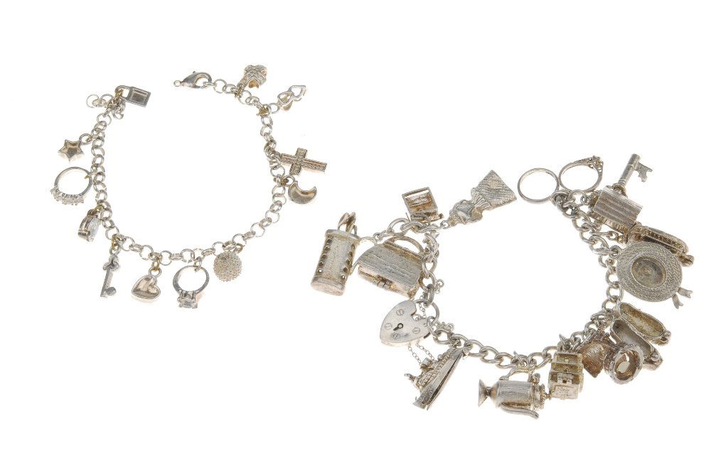 Two charm bracelets. The first with belcher-link chain, (1 of 3)