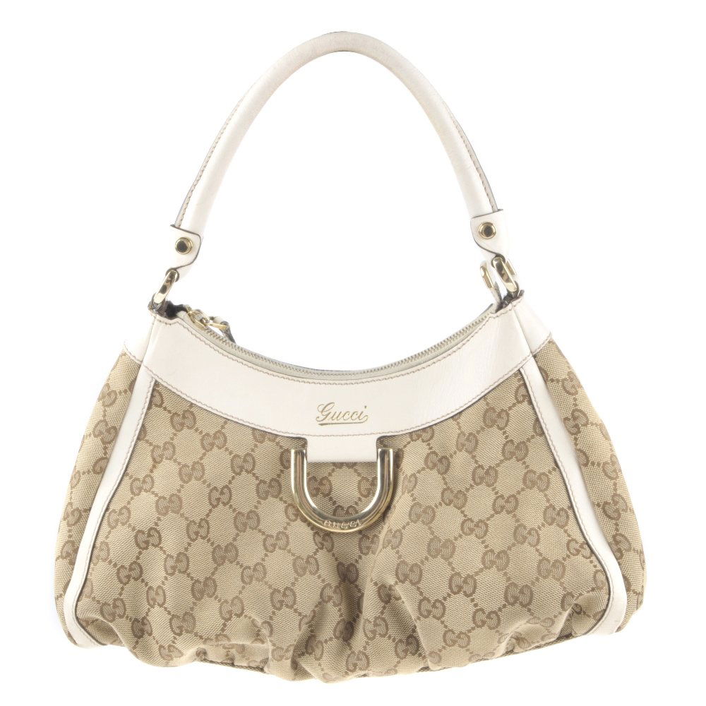 GUCCI - a canvas D-ring hobo handbag. Crafted from (1 of 3)