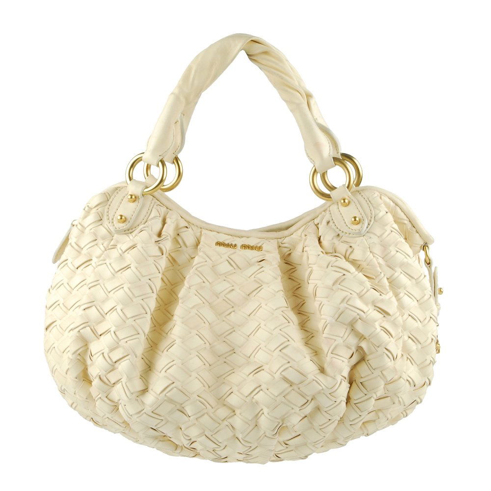 MIU MIU - a woven leather handbag. Designed with a: MIU MIU - a woven leather handbag. Designed with a cream woven leather exterior, matte gold-tone hardware to include maker's front logo lettering and side clips, with double wrapped leather handles, t