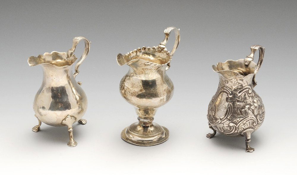 A selection of three George II/III silver cream jugs, (1 of 8)