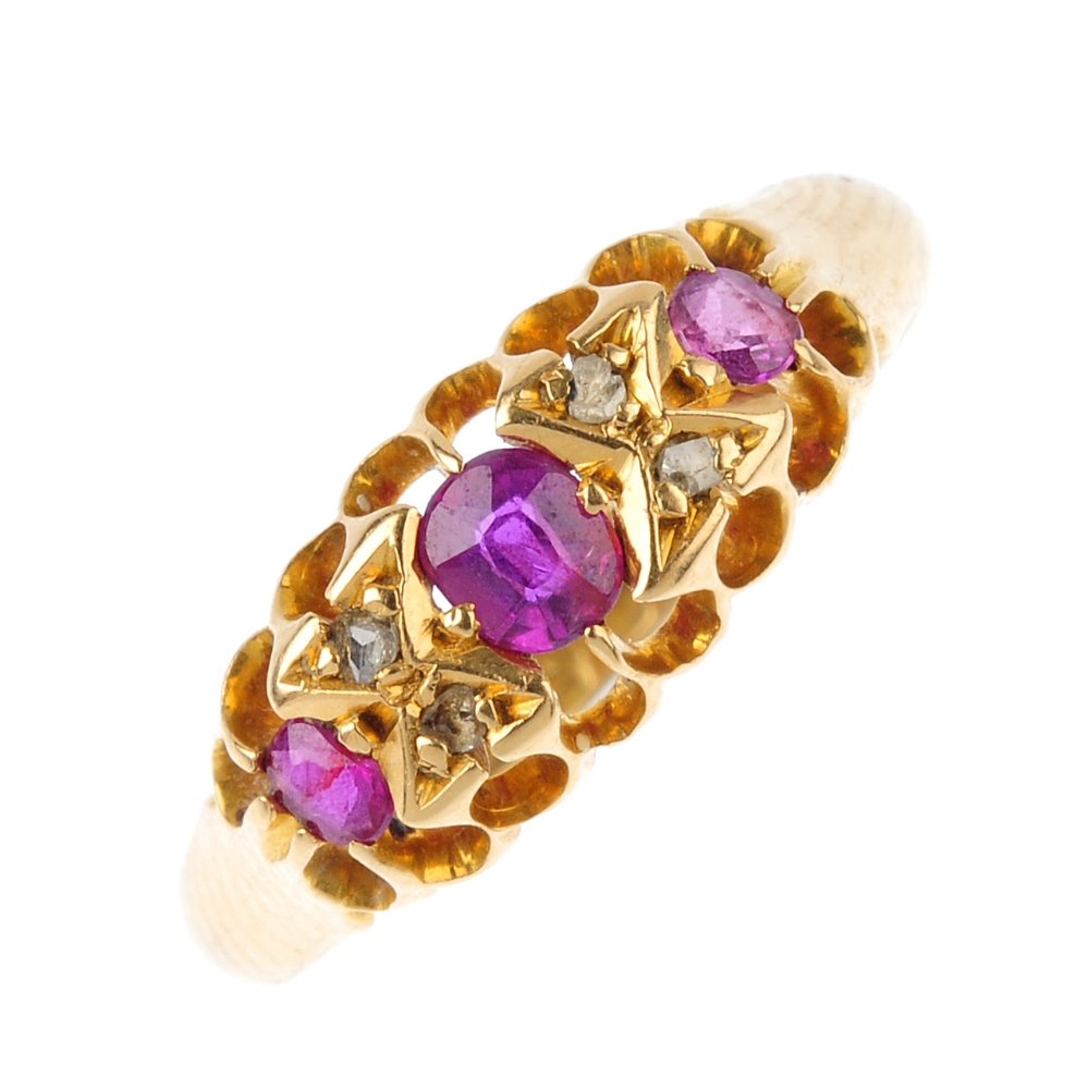 An Edwardian 18ct gold ruby and diamond ring. The (1 of 3)