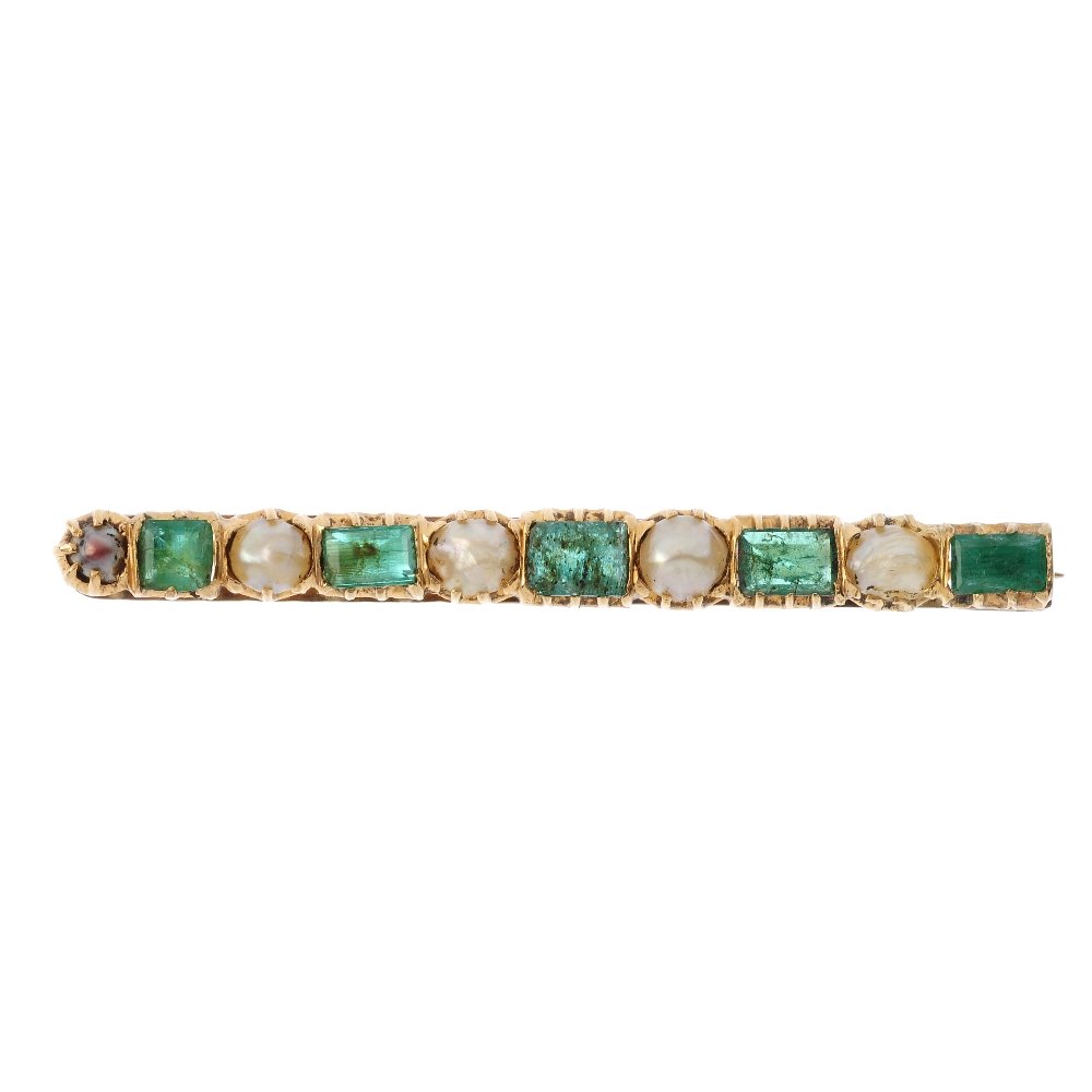 An emerald and pearl brooch. Comprising an alternating (1 of 2)