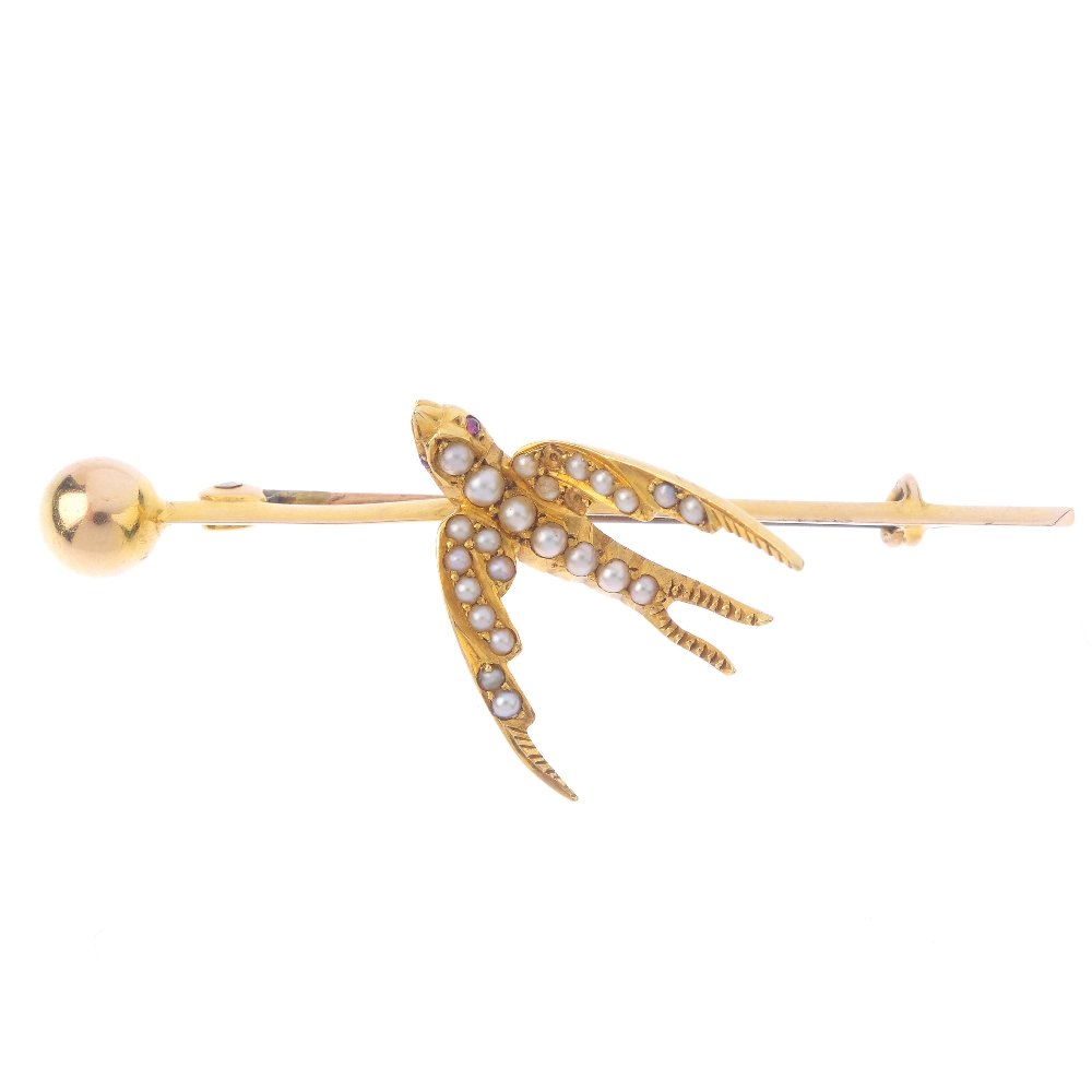 A late Victorian gold split pearl swallow brooch. The (1 of 2)