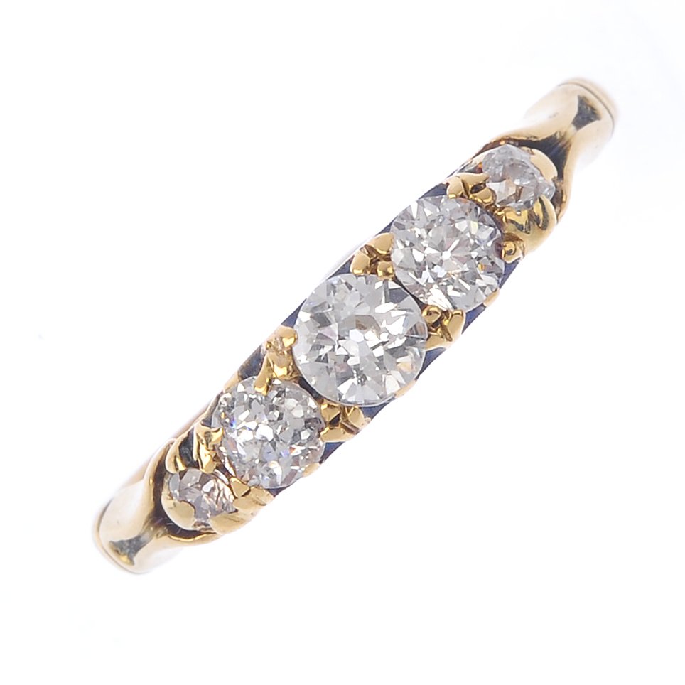 A diamond five-stone ring. The graduated vari-cut (1 of 3)