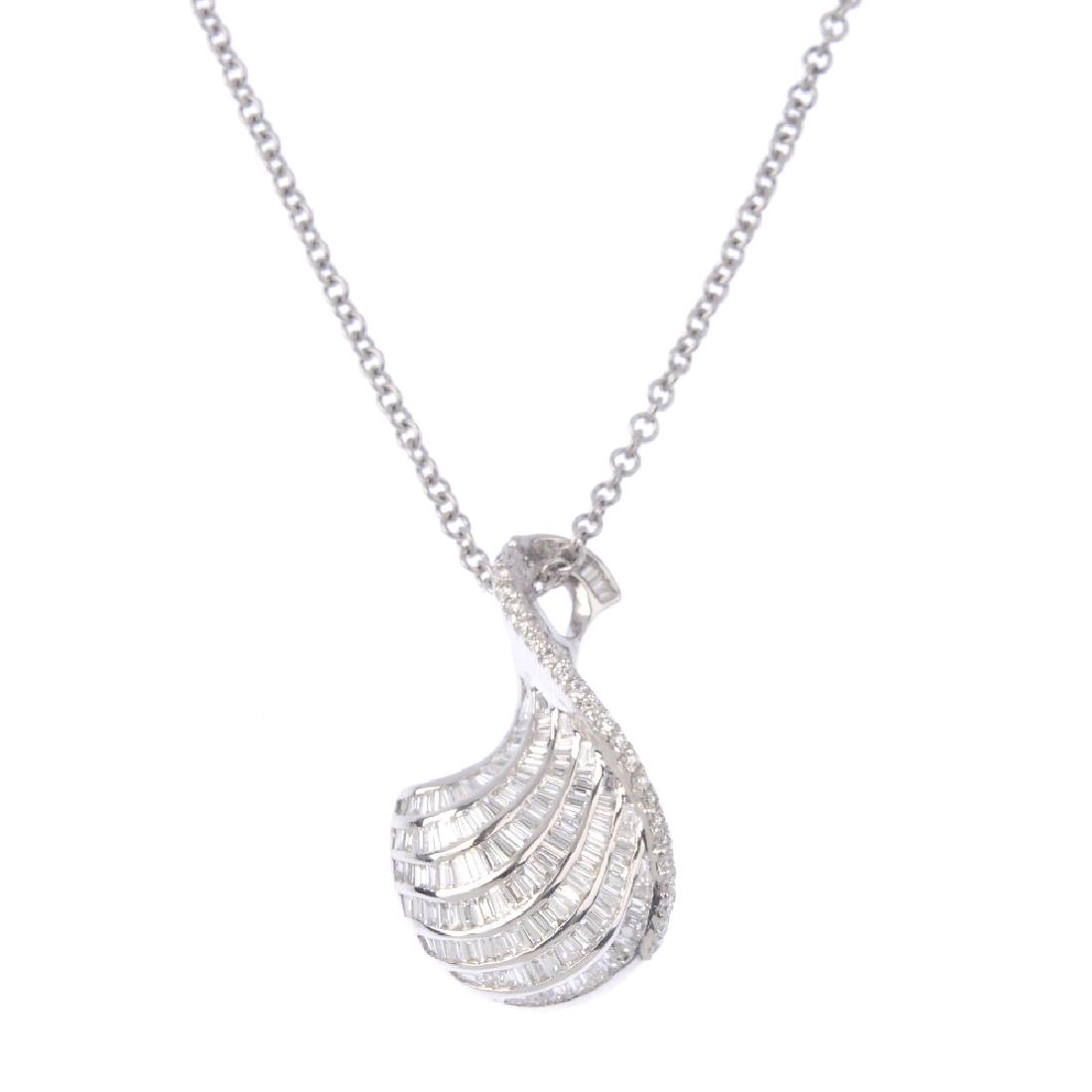 An 18ct gold diamond pendant. The vari-cut diamond (1 of 3)