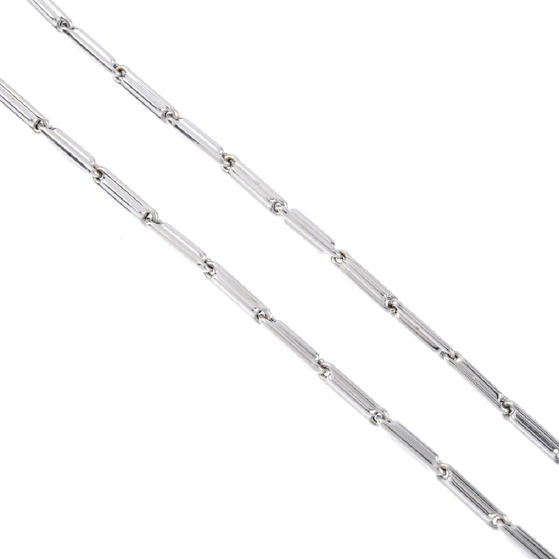 CHIMENTO - a necklace. Designed as a series of stylised: CHIMENTO - a necklace. Designed as a series of stylised trombone links, with brilliant-cut diamond clasp. Signed Chimento. Italian marks. Length 50.5cms. Weight 11.2gms.