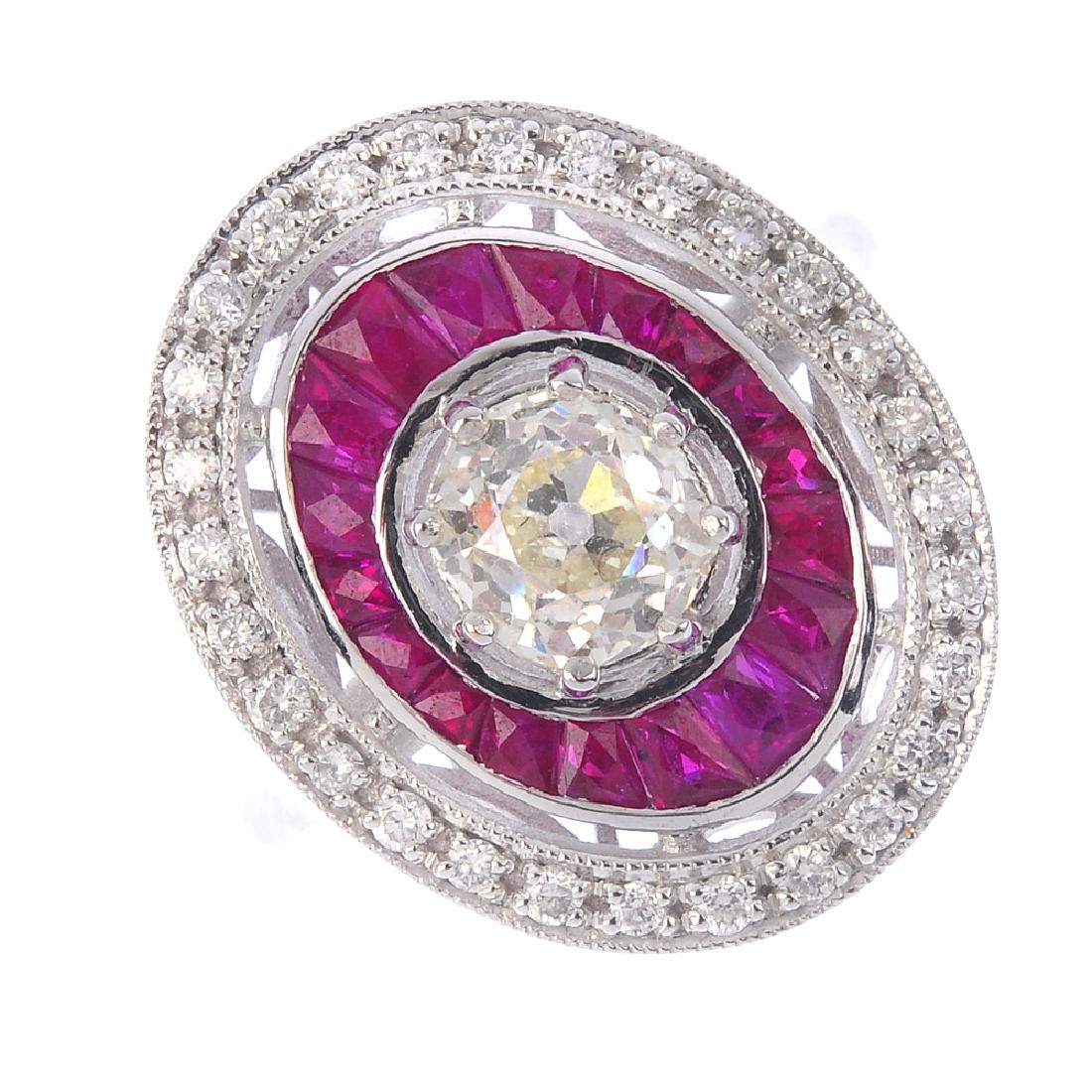 A diamond and ruby dress ring. Of oval outline, the (1 of 4)