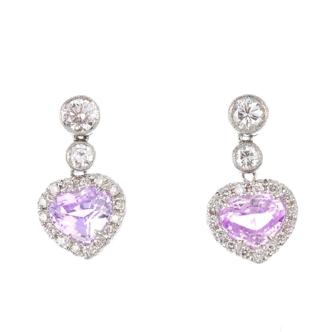 A pair of sapphire and diamond earrings. Each designed (1 of 2)