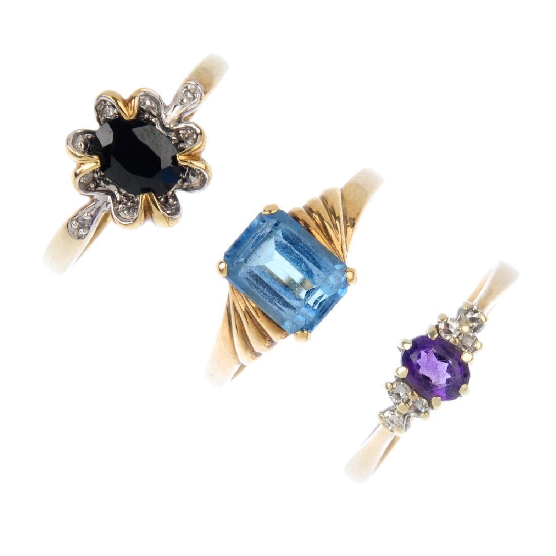 Three 9ct gold gem-set dress rings. To include an (1 of 3)