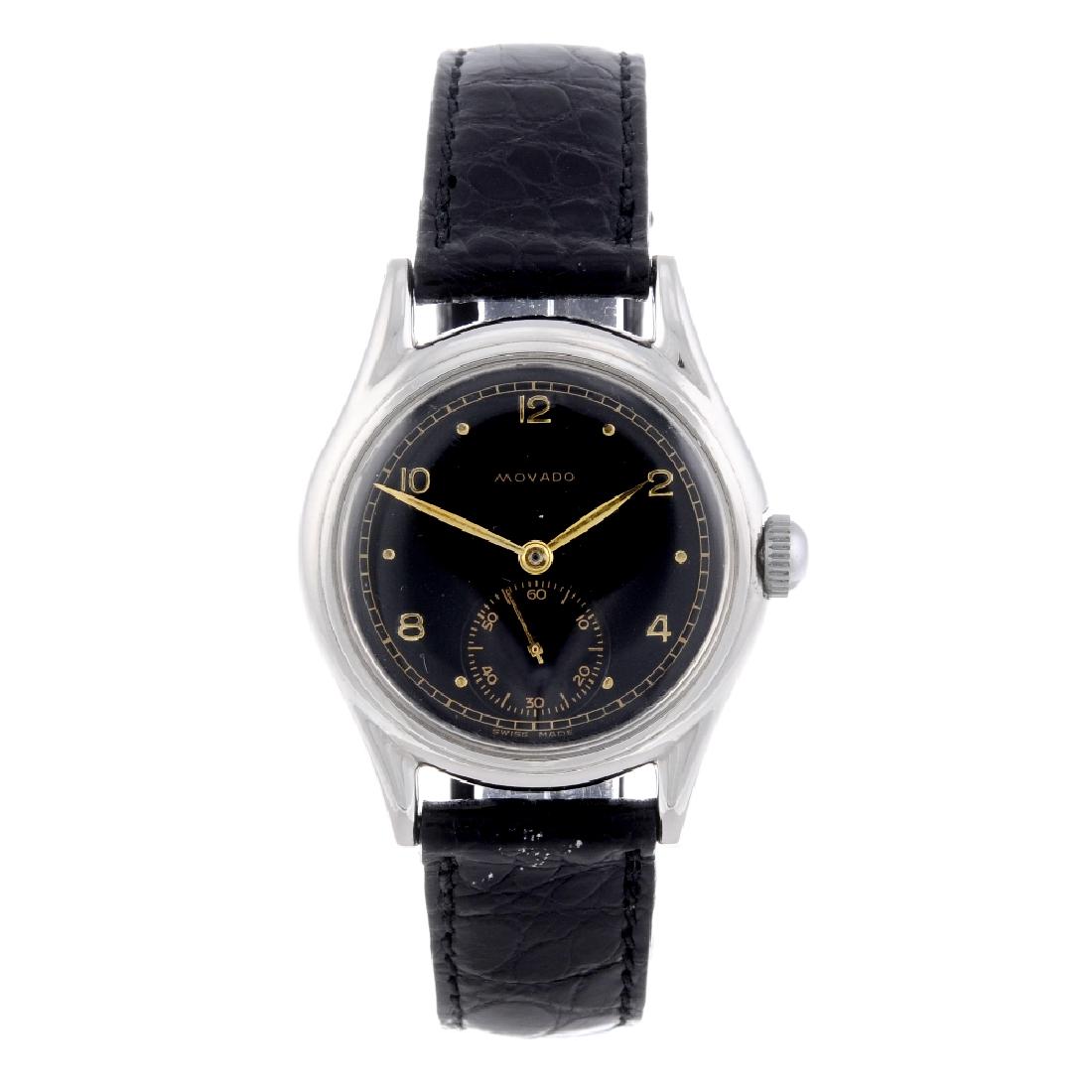 MOVADO - a mid-size wrist watch. Stainless steel case.: MOVADO - a mid-size wrist watch. Stainless steel case. Numbered 0183172 11672. Signed manual wind movement. Black dial with alternating Arabic numeral and dot hour markers, subsidiary seconds dial to
