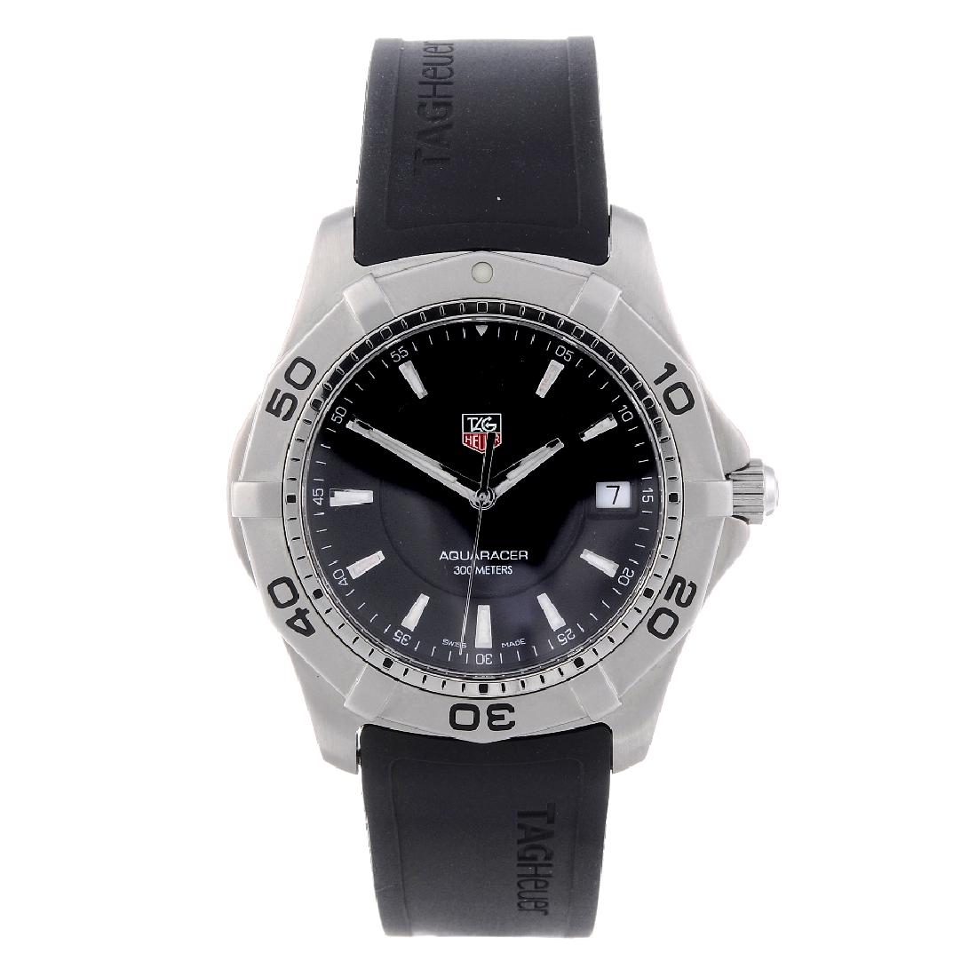 TAG HEUER - a gentleman's Aquaracer wrist watch.: TAG HEUER - a gentleman's Aquaracer wrist watch. Stainless steel case with calibrated bezel. Reference WAF1110, serial YZ9073. Unsigned quartz movement with quick date set. Black dial with luminous ho