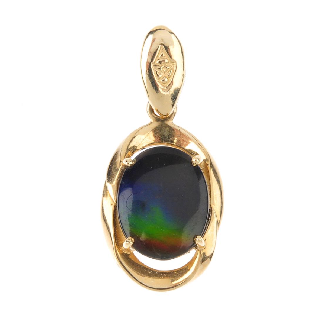An ammolite triplet pendant. The oval-shape ammolite (1 of 1)