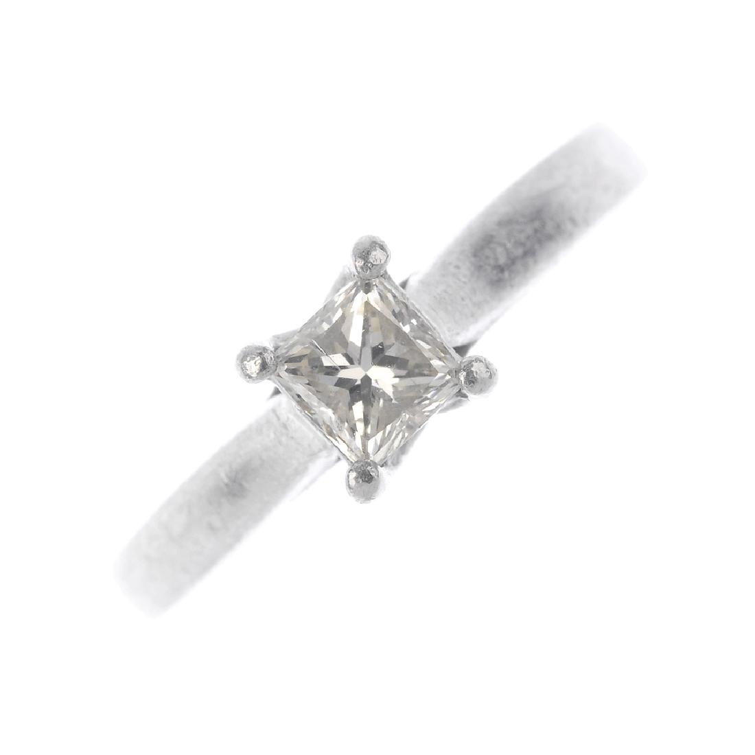 (1345) A platinum diamond single-stone ring. The (1 of 4)