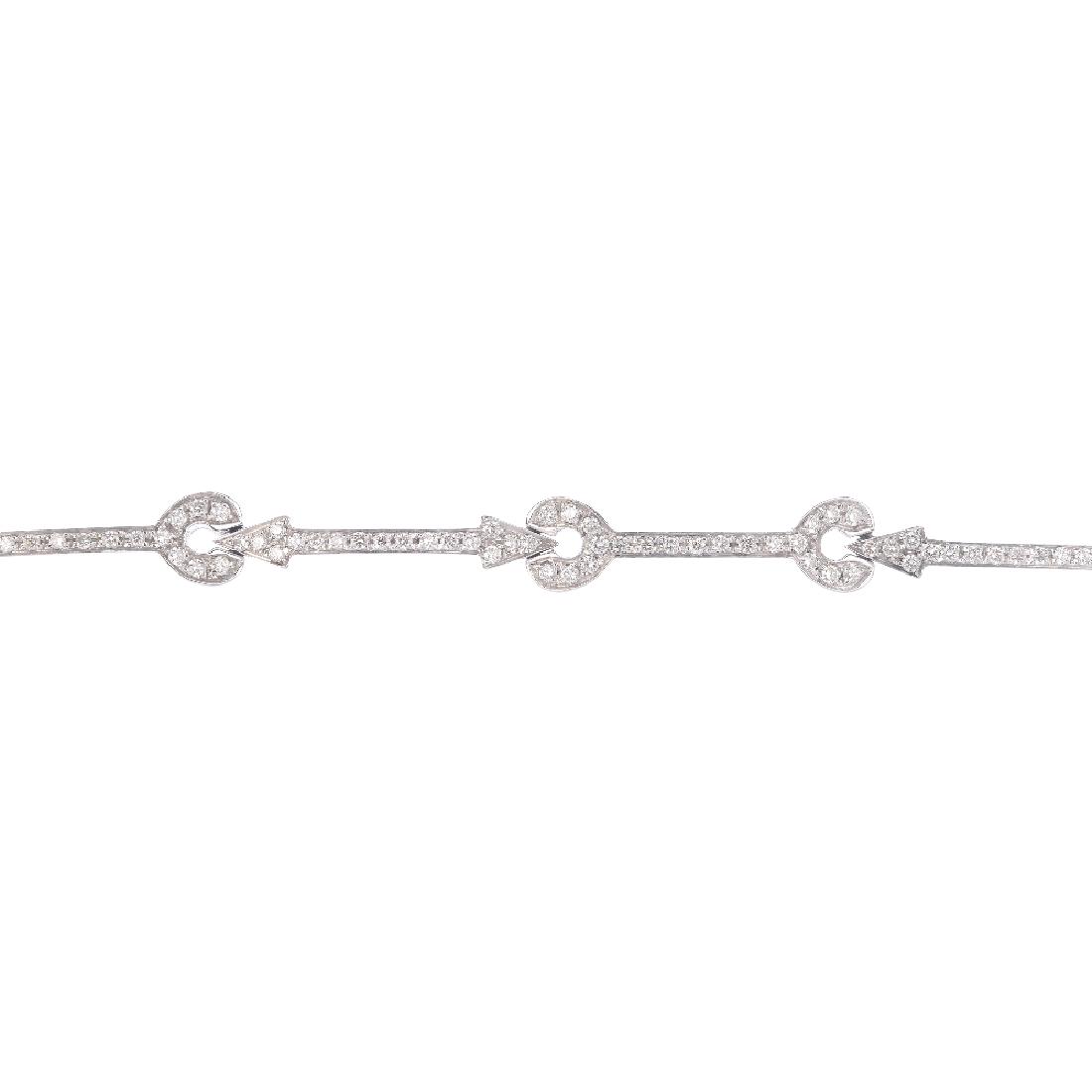 (1546) CHIMENTO - an 18ct gold diamond bracelet.: (1546) CHIMENTO - an 18ct gold diamond bracelet. Designed as a series of brilliant-cut diamond bars, with a similarly-cut diamond partially concealed clasp. Signed Chimento. Estimated total diamond we