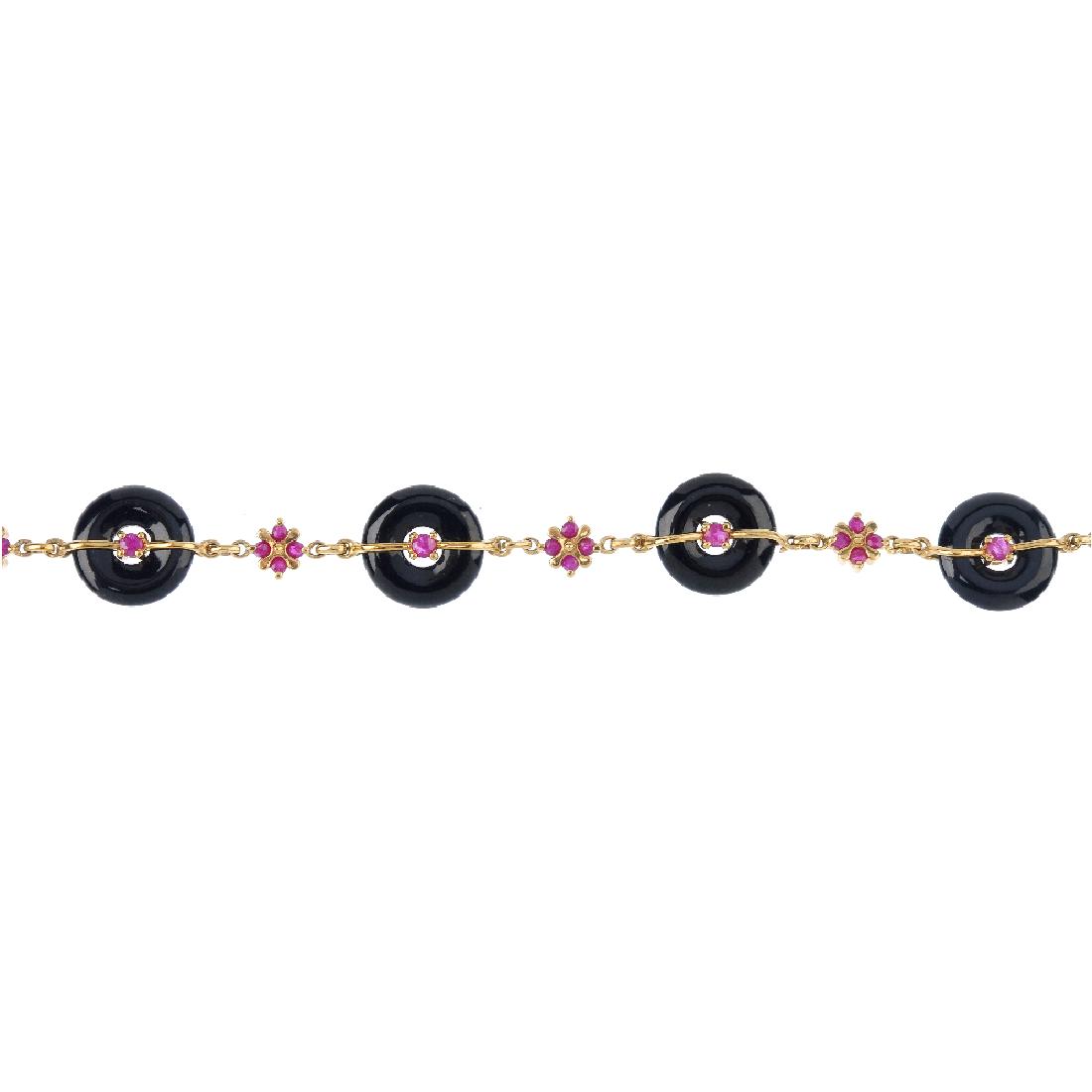 A 9ct gold ruby and onyx bracelet. The ruby and onyx Bi (1 of 3)