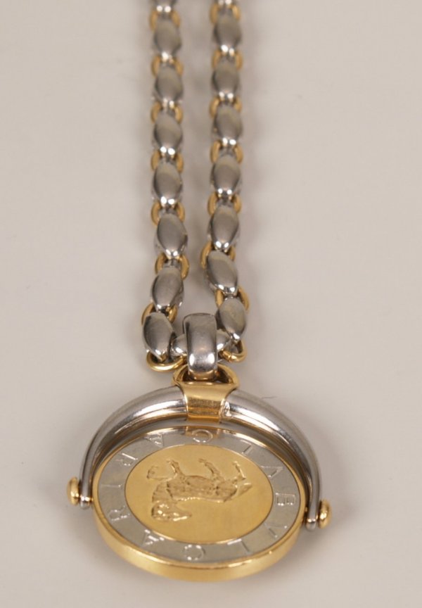 BULGARI - 18ct bi-colour gold swivel pendant depicti