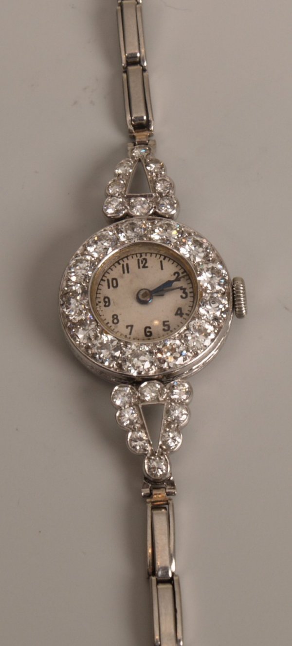 Diamond cocktail watch, the white face with black 