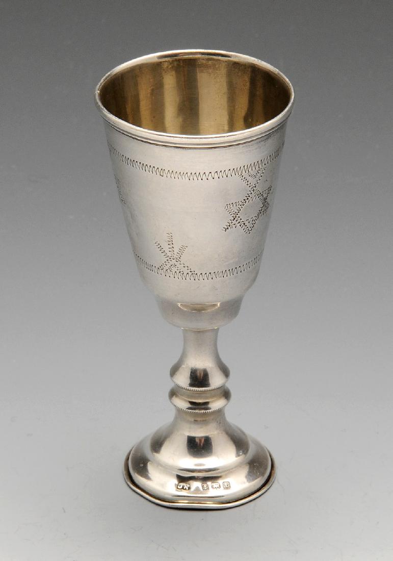 An early twentieth century silver Kiddush cup of: An early twentieth century silver Kiddush cup of traditional form. Hallmarked Birmingham 1918 with the maker's mark JR. Height measuring 4 1/8 inches (10.5 cm), weight 1.2 ozt (39.8 grams).