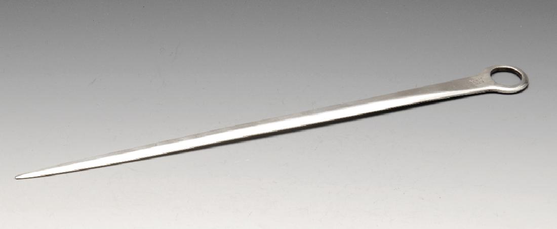 A late George III silver meat skewer, of traditional: A late George III silver meat skewer, of traditional tapered form with initial engraving and loop handle. Hallmarked John Lias, London 1817. Length measuring 12 inches (30.5 cm), weight 2.7 ozt (87 gr