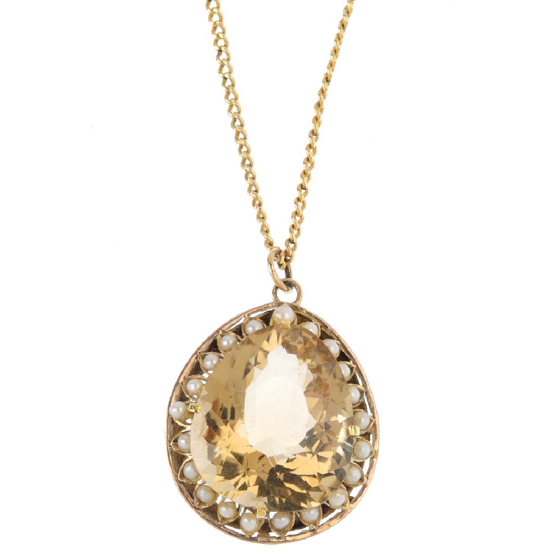 A citrine and seed pearl pendant. The pear-shape (1 of 4)