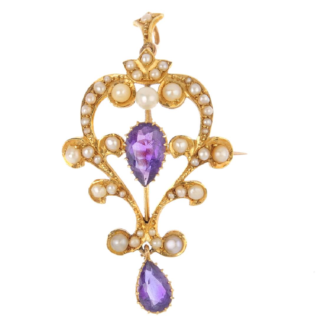 An Edwardian 15ct gold amethyst and split-pearl brooch. (1 of 2)