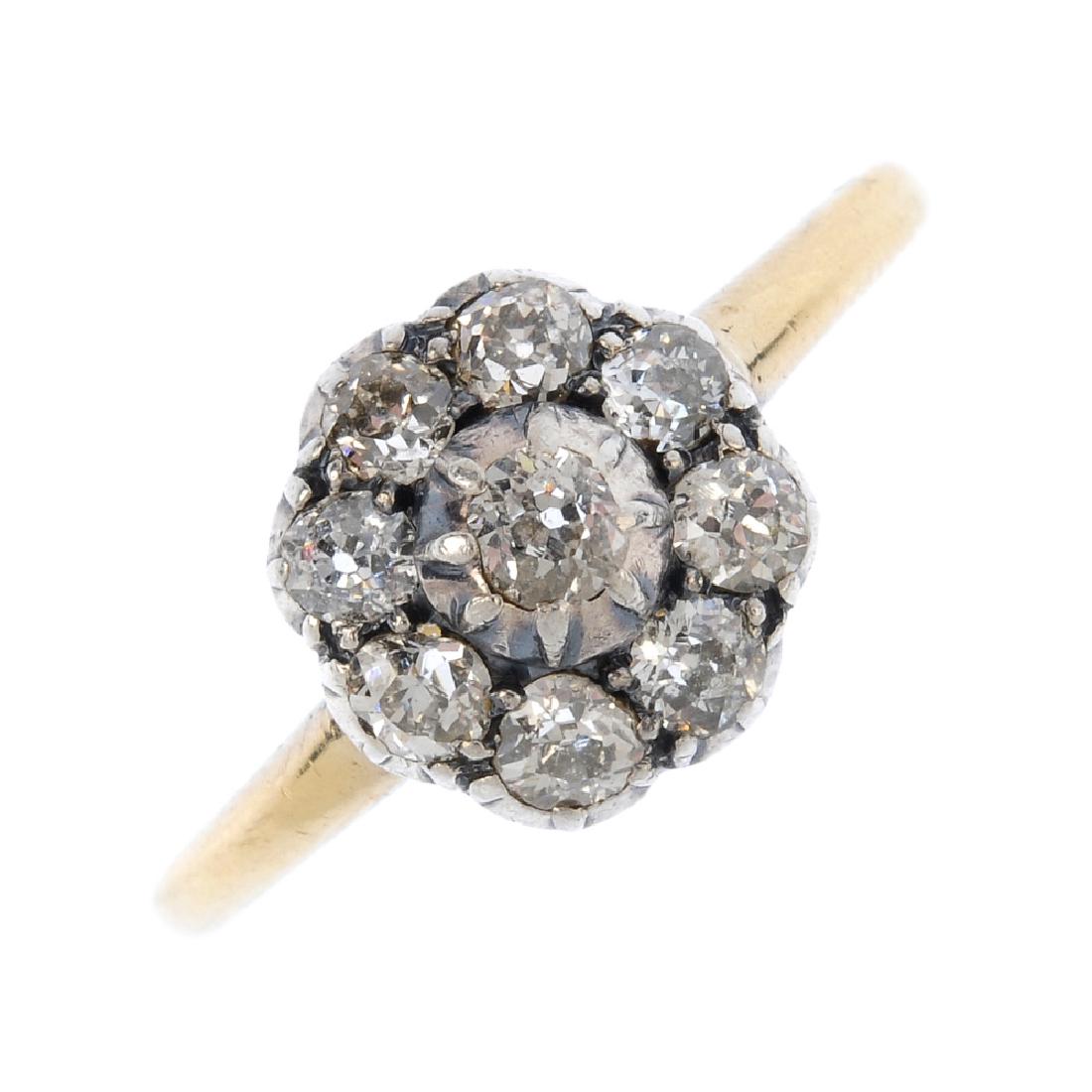 A diamond cluster ring. The old-cut diamond, with (1 of 3)