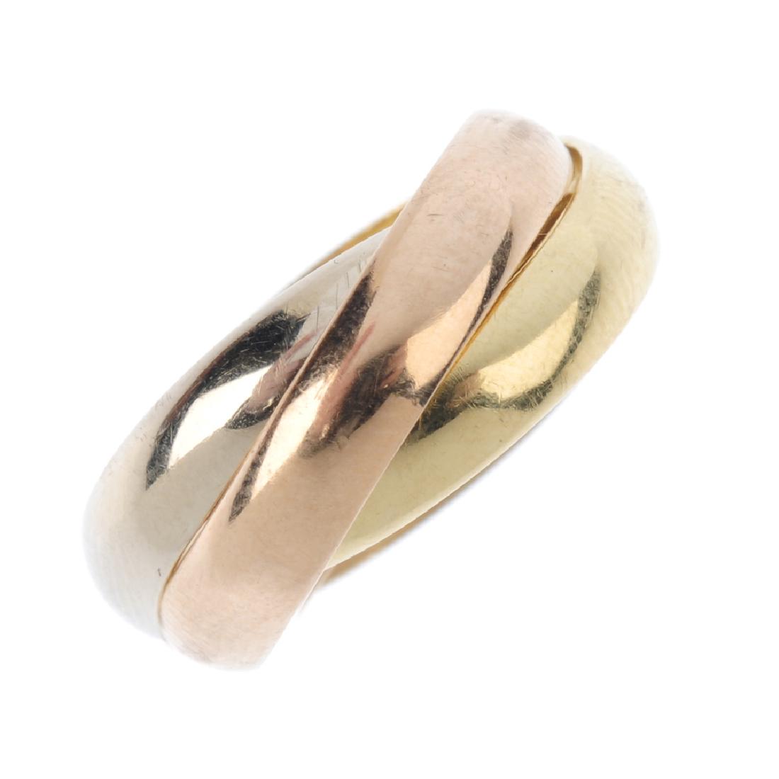 LES MUST DE CARTIER - a 'Trinity' ring. Of tri-colour (1 of 3)