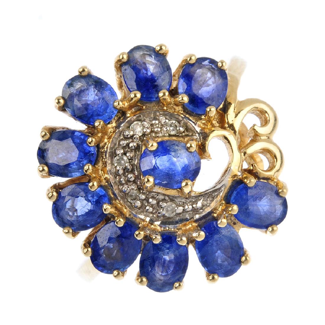 A 9ct gold sapphire and diamond cluster ring. The (1 of 3)