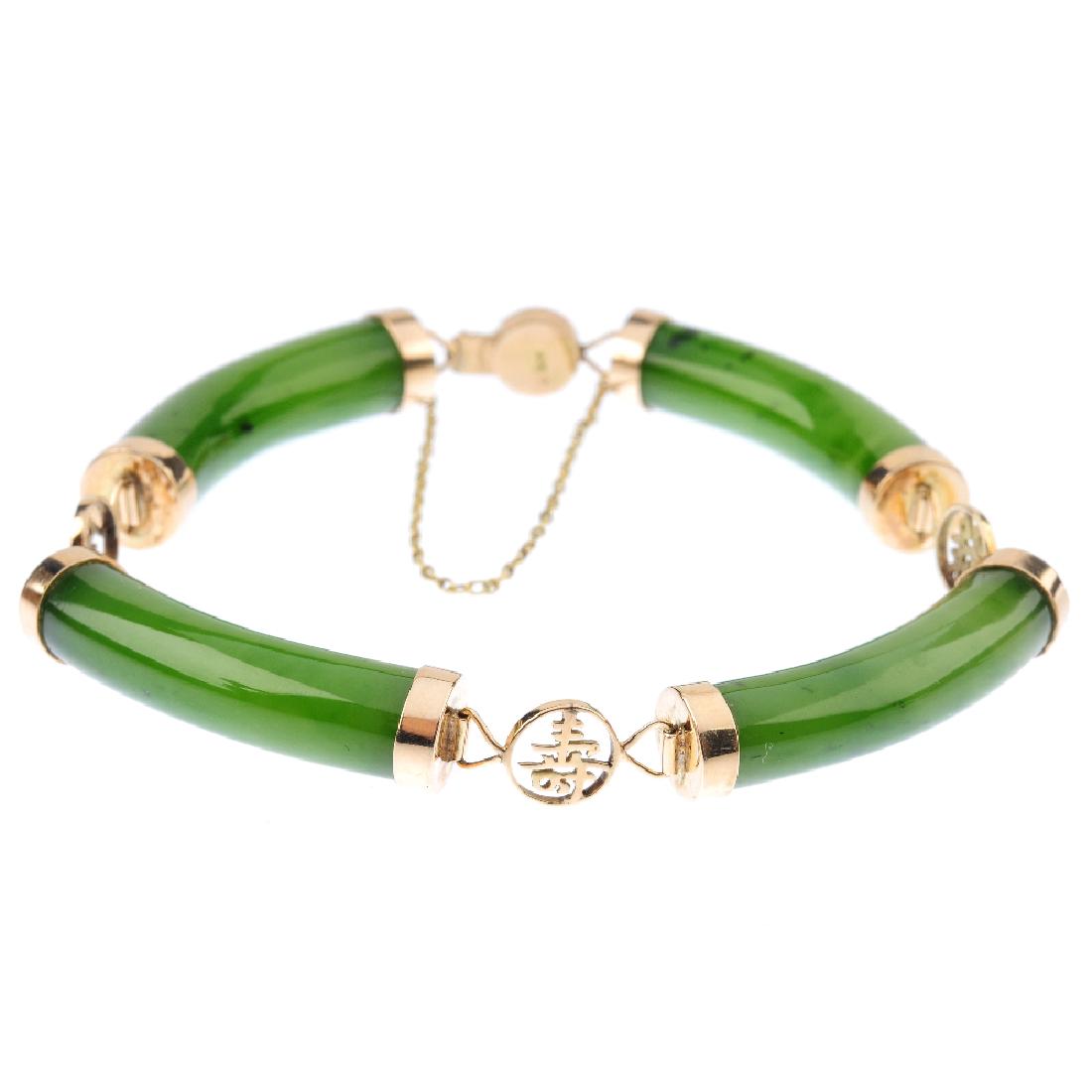 A jade bracelet. Designed as a series of nephrite jade (1 of 4)