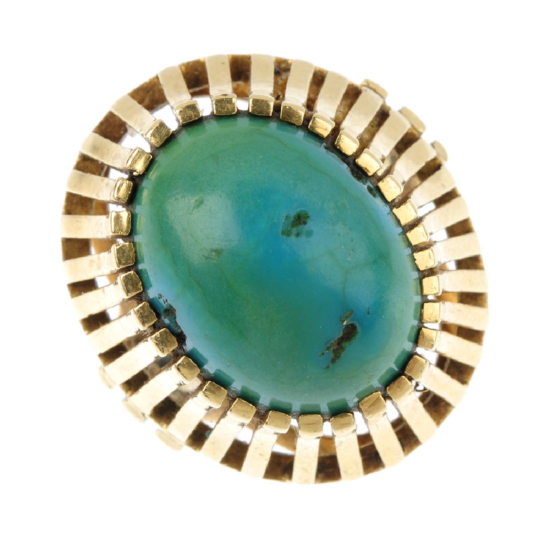 A turquoise single-stone ring. The oval turquoise (1 of 3)