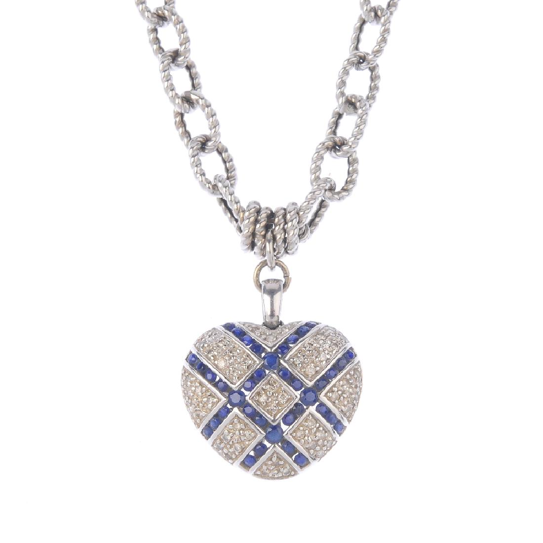 (203799) A diamond and sapphire heart pendant. The (1 of 3)
