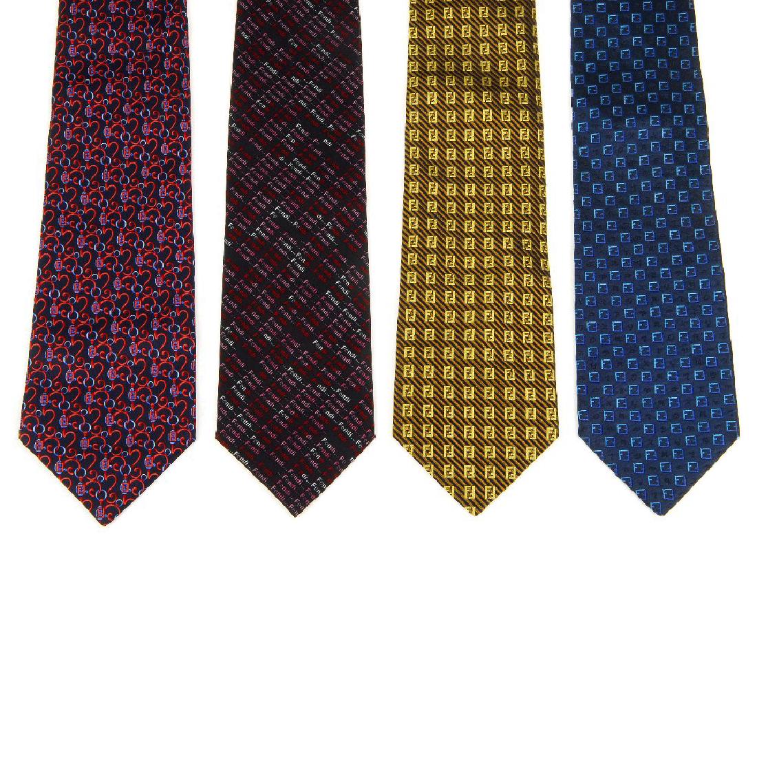 FENDI - four silk ties. To include a navy blue tie with (1 of 3)
