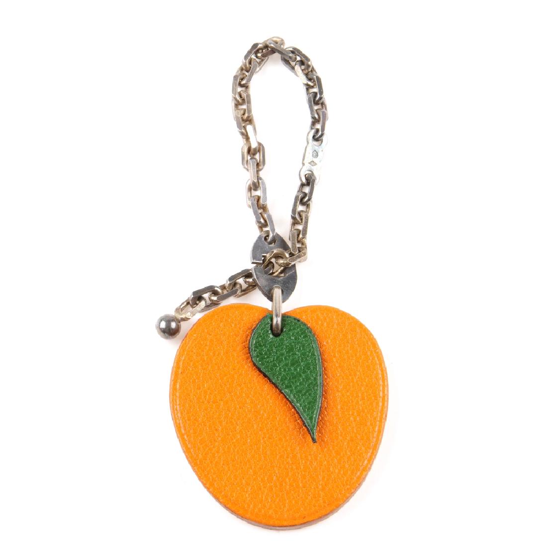 HERMÈS - a fruit key chain. Designed as an apricot in (1 of 4)