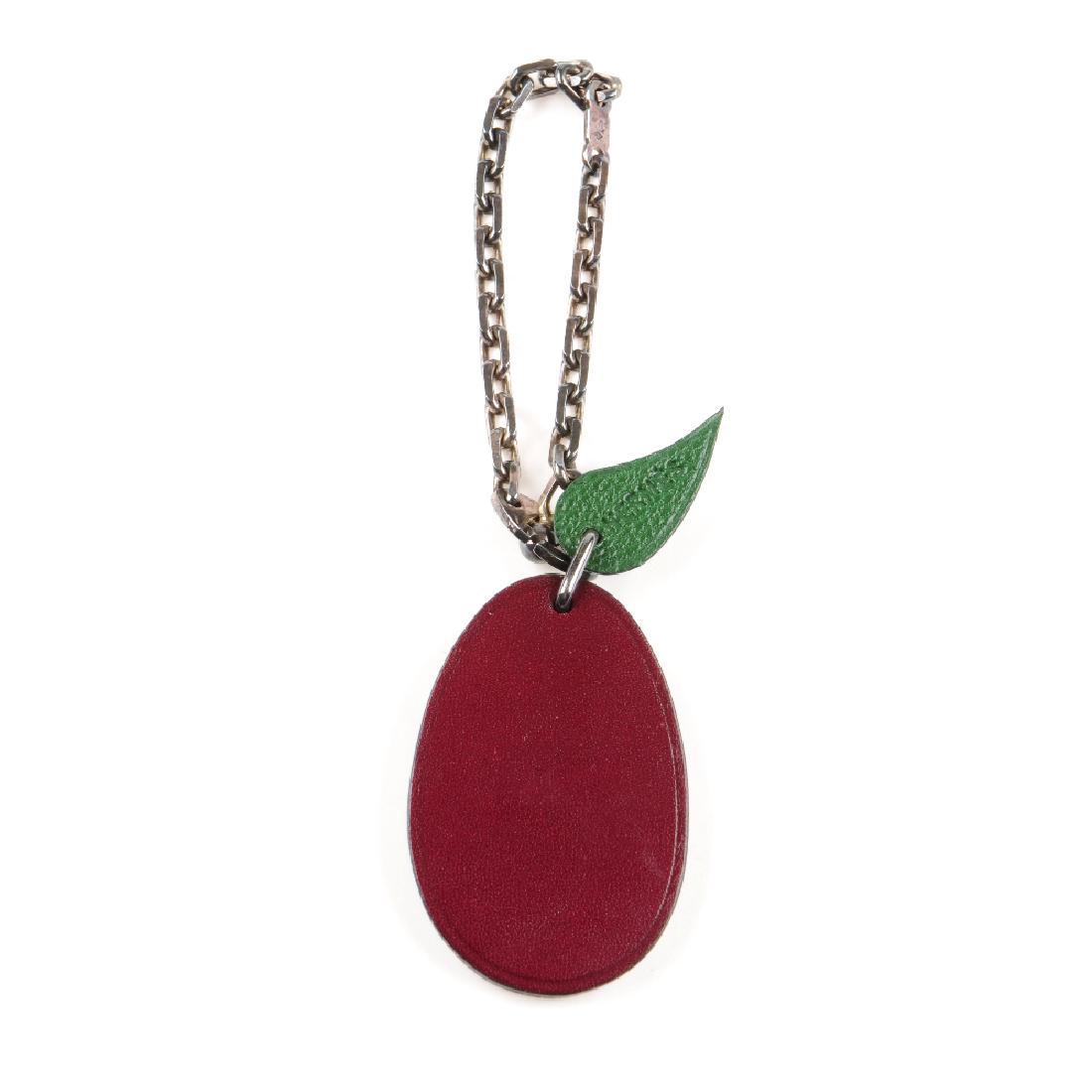 HERMÈS - a fruit key chain. Designed as a burgundy (1 of 4)