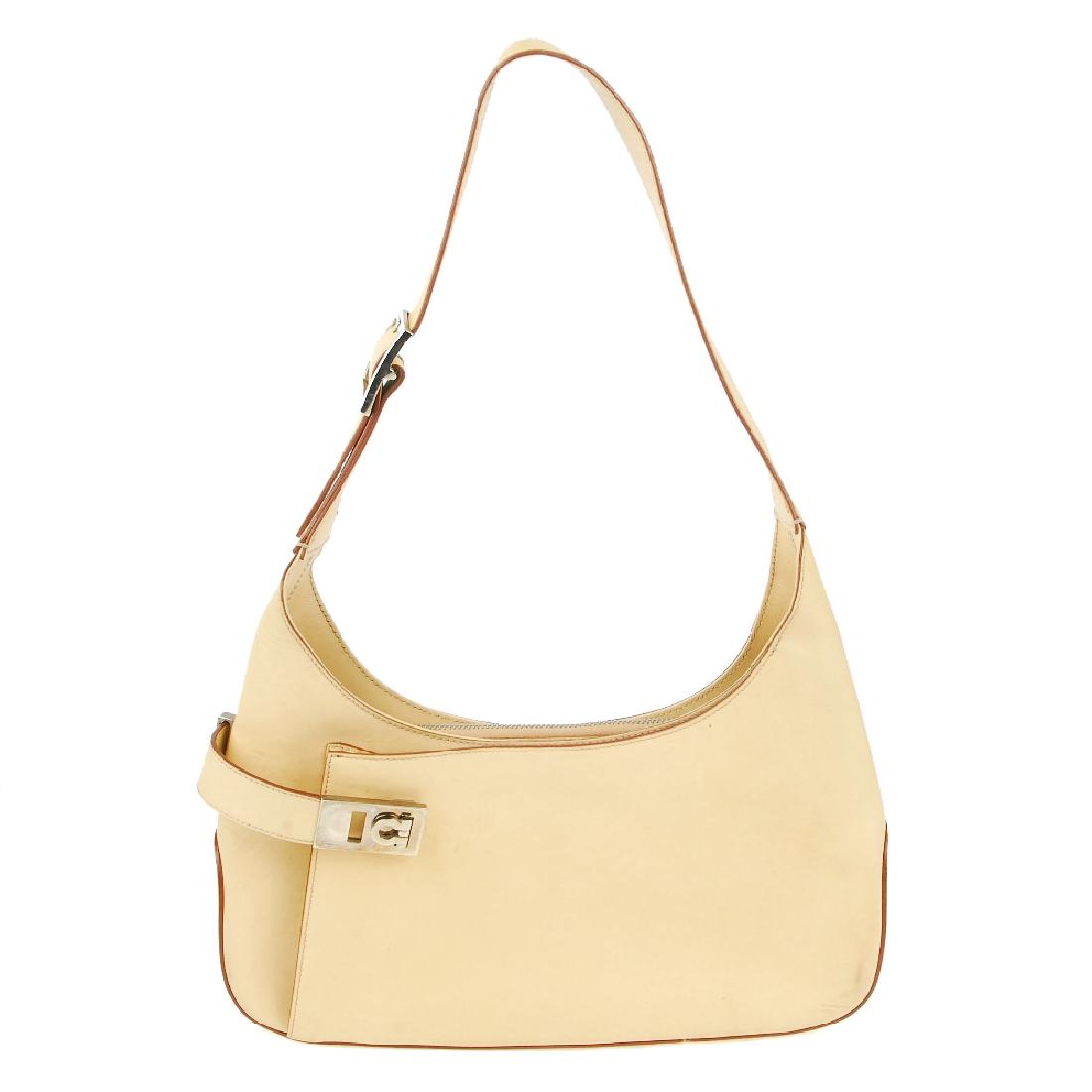 SALVATORE FERRAGAMO - a cream leather handbag. Crafted (1 of 5)