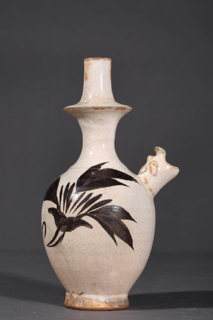 CIZHOU KILN WHITE GLAZED BROWN COLOUR BOTTLE: Cizhou kiln white glazed brown colour bottle: Height 18.5cm, Caliber 2cm