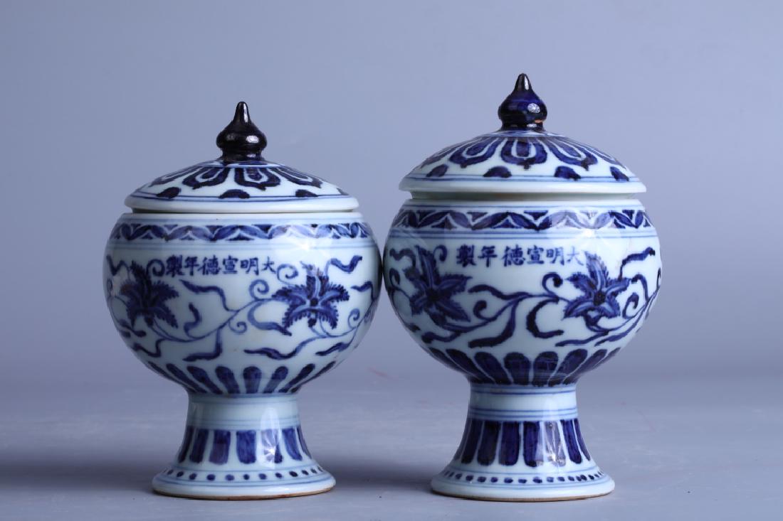 BLUE AND WHITE DOU (PAIR): Blue and white dou (pair): Height 15cm, Width 10cm, Caliber 8cm; Height 14cm, Width 9.5cm, Caliber 8cm