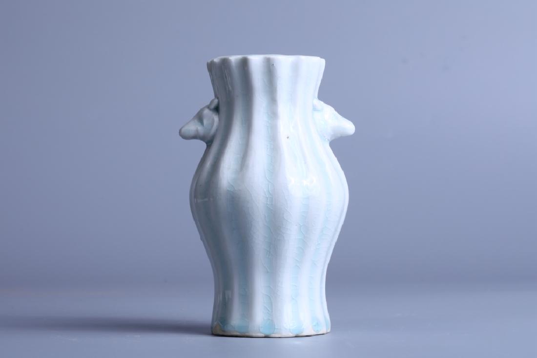 BOTTLE WITH BEAST PATTERN EARS: Bottle with beast pattern ears: Height 13.8cm, Distance of ears 8.5cm, Caliber 5.9cm