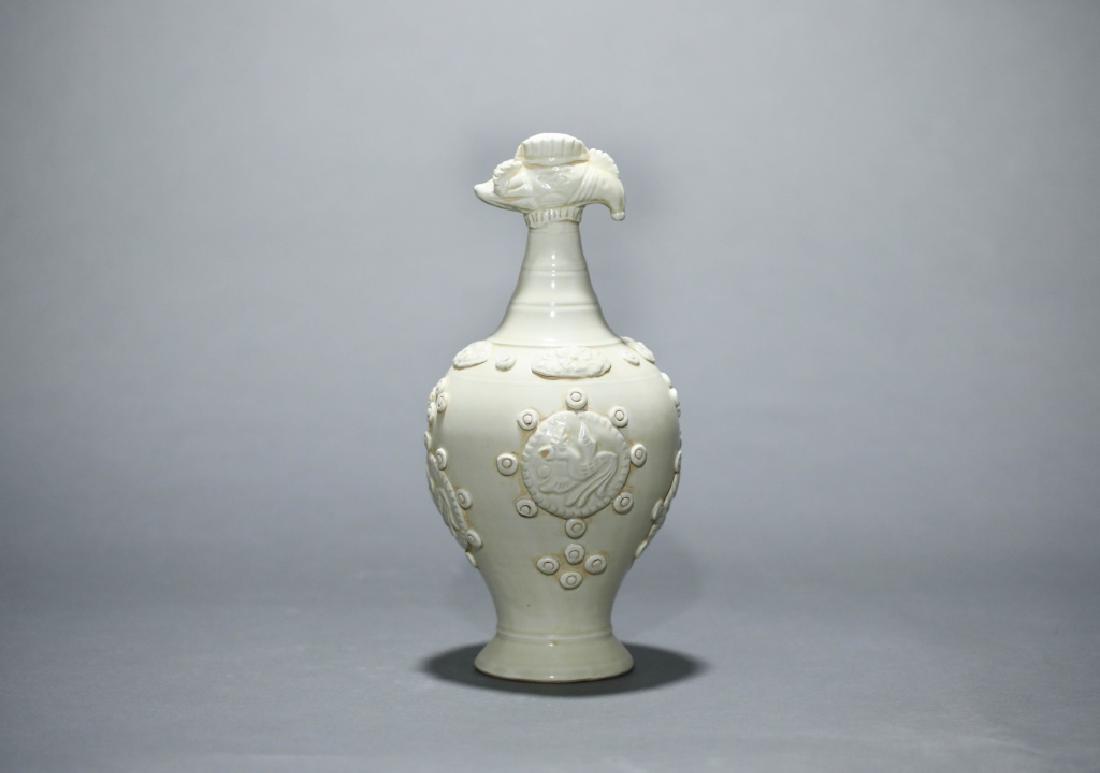 LAMINATED BOTTLE: Laminated bottle: Height 30.5cm, Width 15cm, Caliber 4*3cm