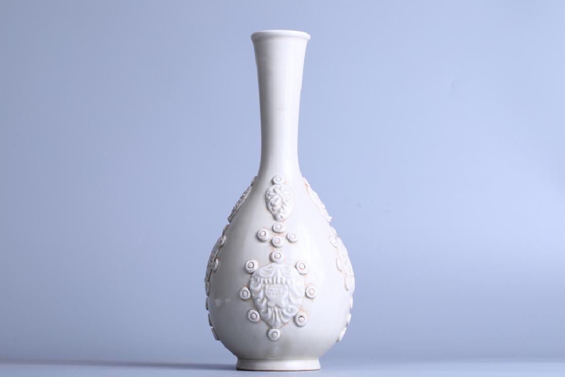 LAMINATED BOTTLE: Laminated bottle: Height 32cm, Width 13cm, Caliber 5.7cm