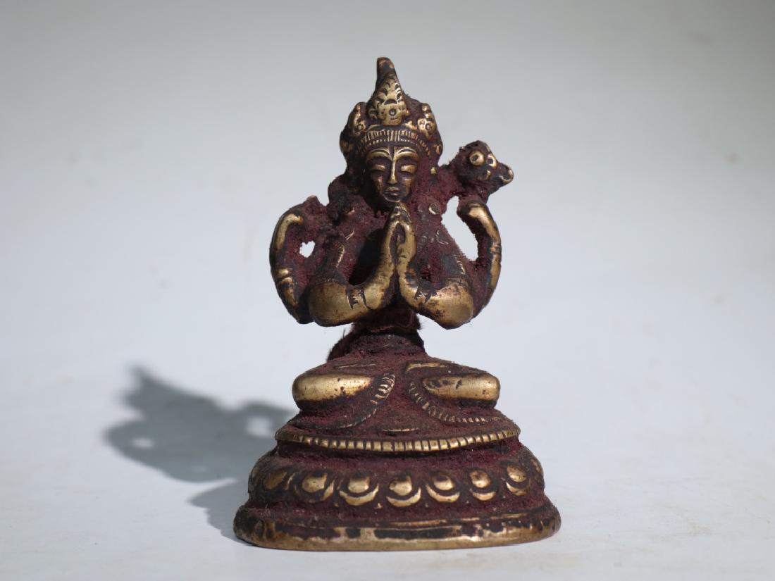 A tibetan copper Buddha statue (1 of 5)