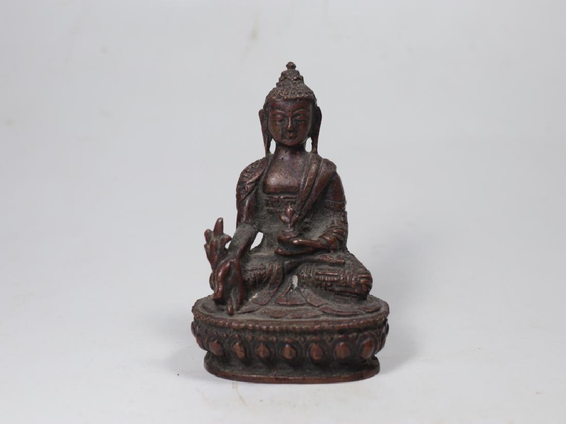 A Tibetan copper Buddha statue (1 of 7)